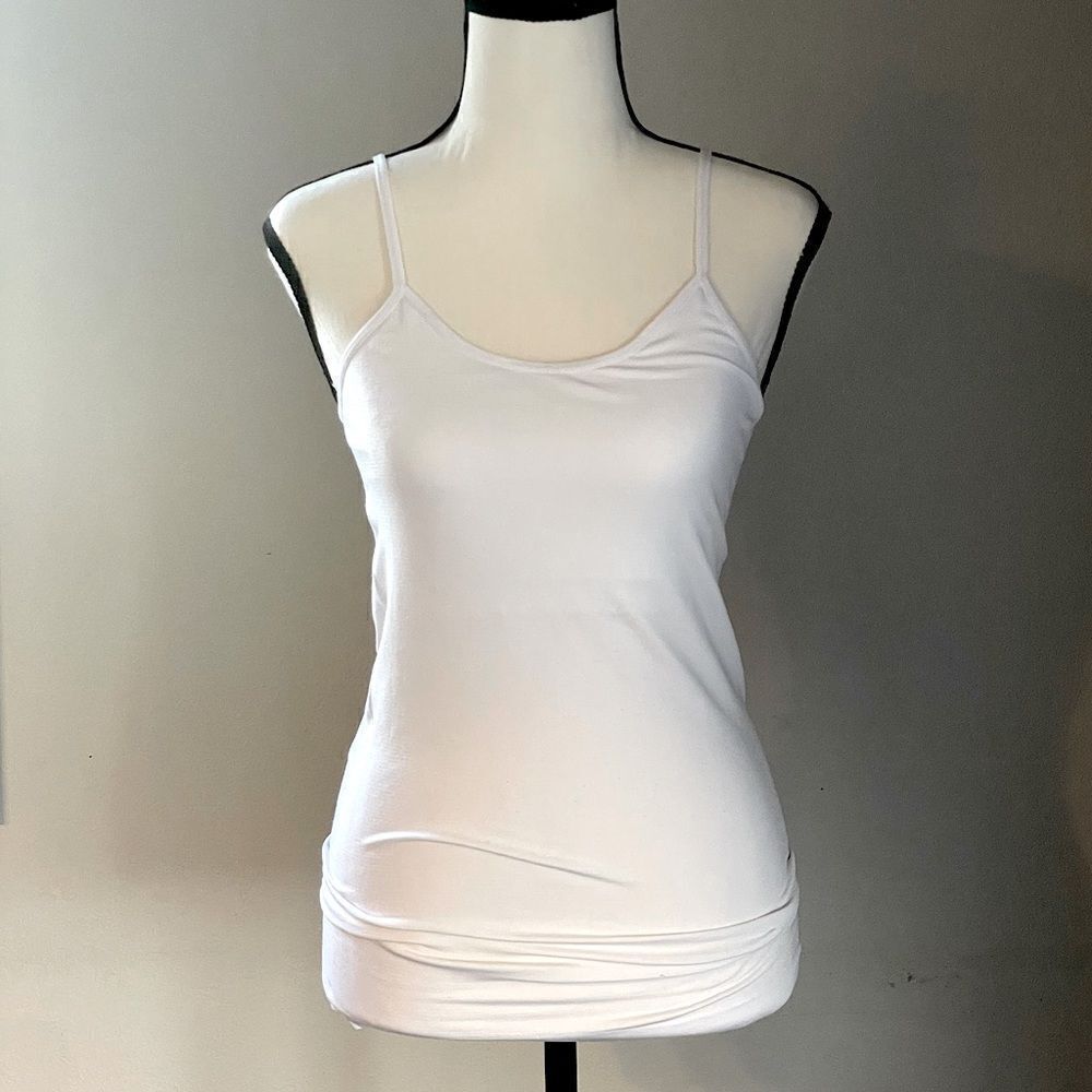 Women’s Tight (like shape wear) White Tank. No Size-Tag but Fits Like a Medium.